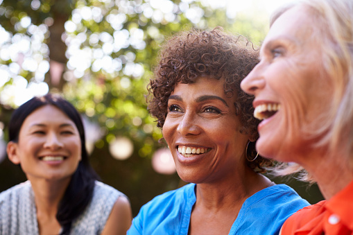 group of older women with dental implants from Roane Family Dental in West Linn, OR